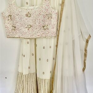 Elegant Cream and Gold Embellished Lehenga